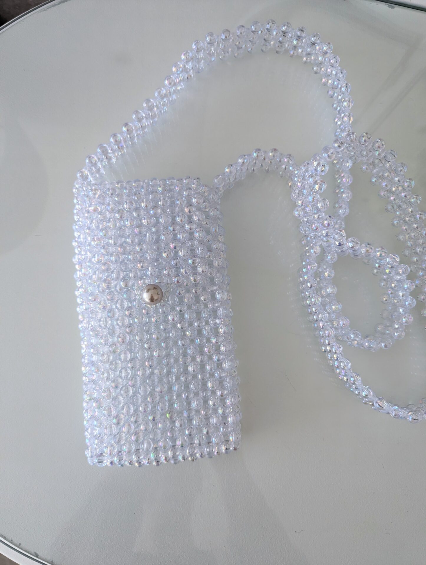 White beaded bag for phone